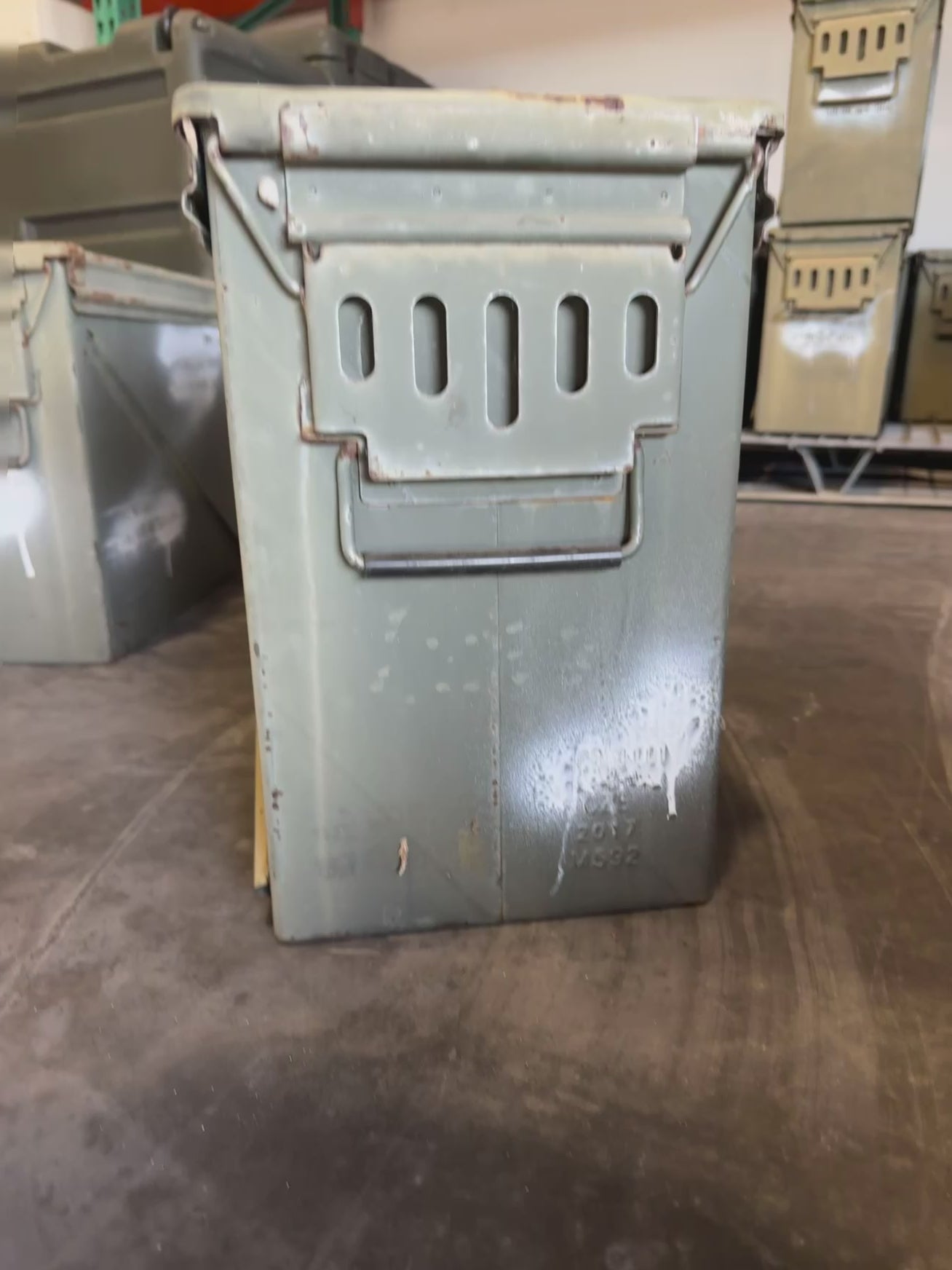 Video rotating a yellow ammunition box showing all sides and stenciled markings.
